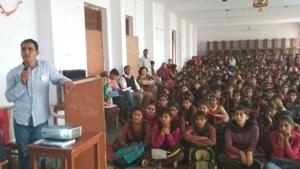 A volunteer — Daughters are Precious Rakshak — interacts with students in Jhunjhunu on Friday.(HT Photo) A volunteer — Daughters are Precious Rakshak — interacts with students in Jhunjhunu on Friday.(HT Photo)