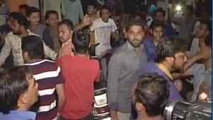 Patidar workers clash with Congress activists in Surat late on Sunday night.(ANI Photo) Patidar workers clash with Congress activists in Surat late on Sunday night.(ANI Photo)