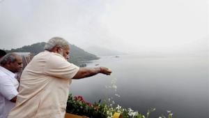 Prime Minister Narendra Modi offers prayers to Narmada River during the inauguration of Sardar Sarovar Dam at Kevadiya in Narmada district.(PTI FILE) Prime Minister Narendra Modi offers prayers to Narmada River during the inauguration of Sardar Sarovar Dam at Kevadiya in Narmada district.(PTI FILE)