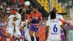 Mumbai City FC players defend a corner during their Indian Super League (ISL) match against FC Pune at the Balewadi Stadium in Pune.(ISL / SPORTZPICS) Mumbai City FC players defend a corner during their Indian Super League (ISL) match against FC Pune at the Balewadi Stadium in Pune.(ISL / SPORTZPICS)