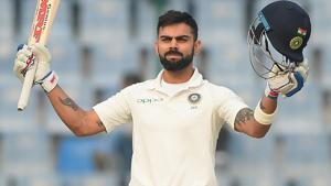 Virat Kohli raises his bat after scoring his century on Day 1 of the third India vs Sri Lanka Test match in New Delhi.(AFP) Virat Kohli raises his bat after scoring his century on Day 1 of the third India vs Sri Lanka Test match in New Delhi.(AFP)