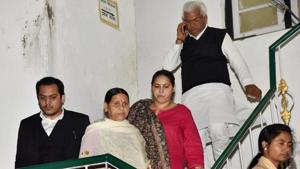 Former Bihar chief minister Rabri Devi along with her daughter and MP Misa Bharti leave after appearing at the Enforcement Directorate (ED) office, in Patna on Saturday.(PTI Photo) Former Bihar chief minister Rabri Devi along with her daughter and MP Misa Bharti leave after appearing at the Enforcement Directorate (ED) office, in Patna on Saturday.(PTI Photo)