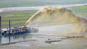 Dredging under way in the river.(HT Photo) Dredging under way in the river.(HT Photo)