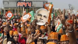 BJP supporters during a rally in Gandhinagar during the Gujarat elections.(PTI) BJP supporters during a rally in Gandhinagar during the Gujarat elections.(PTI)