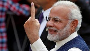 Prime Minister Narendra Modi shows his ink-marked finger after casting his vote outside a polling station during the last phase of Gujarat state assembly election in Ahmedabad, December 14, 2017.(REUTERS) Prime Minister Narendra Modi shows his ink-marked finger after casting his vote outside a polling station during the last phase of Gujarat state assembly election in Ahmedabad, December 14, 2017.(REUTERS)