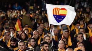 People wait for the start of the center-right party Ciudadanos (Citizens) final campaign meeting for the upcoming Catalan regional election on Monday.(AFP) People wait for the start of the center-right party Ciudadanos (Citizens) final campaign meeting for the upcoming Catalan regional election on Monday.(AFP)