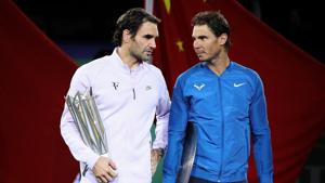 Roger Federer (L) and Rafael Nadal won two grand slam titles each as they turned back the clock in 2017.(Getty Images) Roger Federer (L) and Rafael Nadal won two grand slam titles each as they turned back the clock in 2017.(Getty Images)