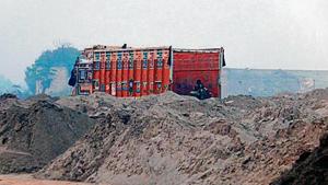 Illegal sand and gravel consignments being offloaded at the site where district Congress vice-president KC Bawa supervises the arrival from Sidhwan Bet near Ludhiana, in an office in Budhlada town of Mansa district.(Sanjeev Kumar/HT) Illegal sand and gravel consignments being offloaded at the site where district Congress vice-president KC Bawa supervises the arrival from Sidhwan Bet near Ludhiana, in an office in Budhlada town of Mansa district.(Sanjeev Kumar/HT)
