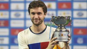 Gilles Simon poses with the Maharashtra Open tennis title after beating Kevin Anderson in the final.(AFP) Gilles Simon poses with the Maharashtra Open tennis title after beating Kevin Anderson in the final.(AFP)