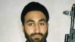 A picture of 26-year-old Mannan Wani, a geology research scholar from Aligarh Muslim University, holding a grenade launcher has gone viral on social media since Sunday night.(Twitter) A picture of 26-year-old Mannan Wani, a geology research scholar from Aligarh Muslim University, holding a grenade launcher has gone viral on social media since Sunday night.(Twitter)