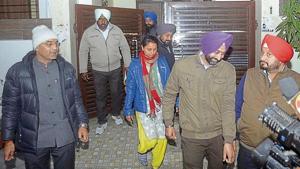 Vigilance bureau officials coming out after conducting a search at former V-C Rajneesh Arora’s house in Amritsar on Tuesday.(Sameer Sehgal/HT) Vigilance bureau officials coming out after conducting a search at former V-C Rajneesh Arora’s house in Amritsar on Tuesday.(Sameer Sehgal/HT)