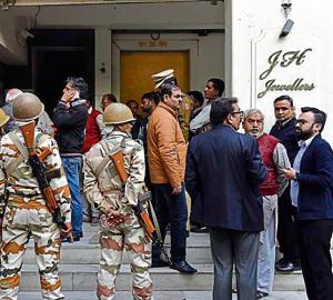 Police, MCD officials and shopkeepers at Sundar Nagar Market in New Delhi on Friday. Police, MCD officials and shopkeepers at Sundar Nagar Market in New Delhi on Friday.