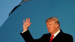 US President Donald Trump waves as he steps off Air Force One, Maryland, January 18.(AFP) US President Donald Trump waves as he steps off Air Force One, Maryland, January 18.(AFP)