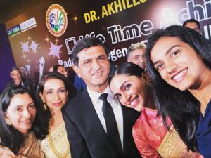Prakash Padukone with daughter Deepika Padukone (rnd right), PV Sindhu (right) and family at the function organised by Badminton Associated of India (BAI) to award him its inaugural Lifetime Achievement Award in New Delhi on Monday.(HT Photo) Prakash Padukone with daughter Deepika Padukone (rnd right), PV Sindhu (right) and family at the function organised by Badminton Associated of India (BAI) to award him its inaugural Lifetime Achievement Award in New Delhi on Monday.(HT Photo)