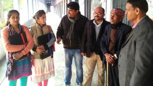 Anand Singh Bisht ,(second from right) father of Uttar Pradesh Chief Minister Yogi Adityanath accompanied his granddaughters to Haridwar for them to register their names at an employment fair.(HT PHOTO) Anand Singh Bisht ,(second from right) father of Uttar Pradesh Chief Minister Yogi Adityanath accompanied his granddaughters to Haridwar for them to register their names at an employment fair.(HT PHOTO)