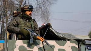 An Army person stands guard outside the CRPF training camp at Lethpora in Pulwama district of south Kashmir.(PTI File Photo) An Army person stands guard outside the CRPF training camp at Lethpora in Pulwama district of south Kashmir.(PTI File Photo)