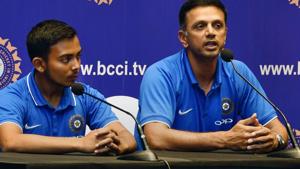 ICC Under-19 Cricket World Cup winning coach Rahul Dravid (right) and Indian U-19 cricket team captain Prithvi Shaw during a press meet after their arrival in Mumbai on Monday.(PTI) ICC Under-19 Cricket World Cup winning coach Rahul Dravid (right) and Indian U-19 cricket team captain Prithvi Shaw during a press meet after their arrival in Mumbai on Monday.(PTI)