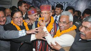 Bharatiya Janata Party supporters offer sweets to Uttarakhand chief minister Trivendra Singh Rawat in Dehradun.(PTI file photo) Bharatiya Janata Party supporters offer sweets to Uttarakhand chief minister Trivendra Singh Rawat in Dehradun.(PTI file photo)