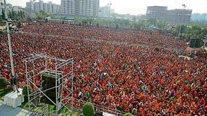 A sea of women, dressed in red, from various age groups thronged a party plot in the city.(HT Photo) A sea of women, dressed in red, from various age groups thronged a party plot in the city.(HT Photo)
