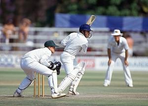 Sanjay Manjrekar batting for India during his innings of 104 runs in the inaugural test match between Zimbabwe and India at the Harare Sports Club, 21st October 1992. The Zimbabwe wicketkeeper is Andy Flower. The match ended in a draw.(David Munden/Popperfoto/Getty Images)