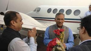 Chief minister TS Rawat (centre) being received at the Lucknow airport.(HT File Photo) Chief minister TS Rawat (centre) being received at the Lucknow airport.(HT File Photo)