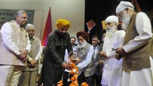 (From left) Vidhan Sabha Speaker Rana KP Singh, Panjab University vice-chancellor Arun Kumar Grover, local bodies minister Navjot Singh Sidhu, author Surjit Patar and others inaugurating the World Punjabi Conference at Panjab University in Chandigarh on Saturday.(Karun Sharma/HT)