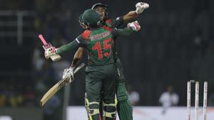 Bangladesh's Mushfiqur Rahim, back to camera, and Mehidy Hasan celebrate their team's victory over Sri Lanka in the Twenty20 cricket match in Nidahas Trophy triangular series in Colombo on Saturday.(AP) Bangladesh's Mushfiqur Rahim, back to camera, and Mehidy Hasan celebrate their team's victory over Sri Lanka in the Twenty20 cricket match in Nidahas Trophy triangular series in Colombo on Saturday.(AP)