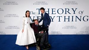 Scientist Stephen Hawking with British actors Felicity Jones (L) and Eddie Redmayne (R) at the UK premiere of the film 'The Theory of Everything' in London in 2014. The film was based on the memoir Travelling to Infinity: My Life with Stephen, by Jane Hawking, the scientist’s first wife.(AFP file photo) Scientist Stephen Hawking with British actors Felicity Jones (L) and Eddie Redmayne (R) at the UK premiere of the film 'The Theory of Everything' in London in 2014. The film was based on the memoir Travelling to Infinity: My Life with Stephen, by Jane Hawking, the scientist’s first wife.(AFP file photo)