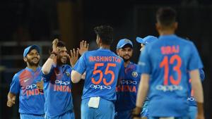 Indian cricketer Washington Sundar (C) celebrates with his teammates after he dismissed Bangladesh cricketer Tamim Iqbal during the fifth Twenty20 (T20) international cricket match of the tri-nation Nidahas Trophy at the R. Premadasa stadium in Colombo on Wednesday.(AFP) Indian cricketer Washington Sundar (C) celebrates with his teammates after he dismissed Bangladesh cricketer Tamim Iqbal during the fifth Twenty20 (T20) international cricket match of the tri-nation Nidahas Trophy at the R. Premadasa stadium in Colombo on Wednesday.(AFP)