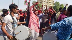 Samajwadi Party supporters celebrate their win against the BJP in Phulpur and Gorakhpur Lok Sabha by-election results, in Allahabad on Wednesday.(PTI)