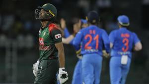 Bangladesh's Mahmudullah leaves after being dismissed as Indian cricket team members celebrate during their second Twenty20 match in Nidahas Trophy triangular series in Colombo, Sri Lanka, on March 14, 2018.(AP) Bangladesh's Mahmudullah leaves after being dismissed as Indian cricket team members celebrate during their second Twenty20 match in Nidahas Trophy triangular series in Colombo, Sri Lanka, on March 14, 2018.(AP)