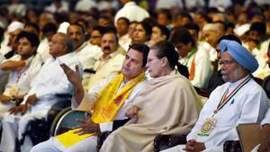 Former Congress president Sonia Gandhi and president Rahul Gandhi talk as former Prime Minister Manmohan Singh looks on, during the 84th Plenary Session of the Indian National Congress at the Indira Gandhi Stadium in New Delhi on Saturday.(PTI Photo) Former Congress president Sonia Gandhi and president Rahul Gandhi talk as former Prime Minister Manmohan Singh looks on, during the 84th Plenary Session of the Indian National Congress at the Indira Gandhi Stadium in New Delhi on Saturday.(PTI Photo)
