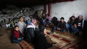 People take cover in a cellar in the village of Qastal Koshk, north of Afrin on March 16, 2018, amid battles between Turkish-backed forces and Kurdish fighters.(AFP Photo) People take cover in a cellar in the village of Qastal Koshk, north of Afrin on March 16, 2018, amid battles between Turkish-backed forces and Kurdish fighters.(AFP Photo)
