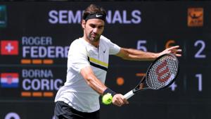 Roger Federer hits a backhand during his semi-final victory over Borna Coric during the BNP Paribas Open at the Indian Wells Tennis Garden on Saturday.(AFP) Roger Federer hits a backhand during his semi-final victory over Borna Coric during the BNP Paribas Open at the Indian Wells Tennis Garden on Saturday.(AFP)