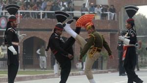 Pakistani Rangers and Indian Border Security Force personnel take part in the daily beating of the retreat ceremony at the India-Pakistan Wagah Border Post.(AFP File) Pakistani Rangers and Indian Border Security Force personnel take part in the daily beating of the retreat ceremony at the India-Pakistan Wagah Border Post.(AFP File)