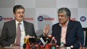 Vice-chairperson and managing director of Kotak Mahindra Bank Uday Kotak speaks as Infosys co-founder & non-executive chairperson Nandan Nilekani looks on, during a press conference in Mumbai on Tuesday.(PTI Photo) Vice-chairperson and managing director of Kotak Mahindra Bank Uday Kotak speaks as Infosys co-founder & non-executive chairperson Nandan Nilekani looks on, during a press conference in Mumbai on Tuesday.(PTI Photo)