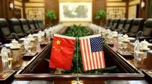 Flags of the US and China are placed for a meeting between officials of the two countries in Beijing.(Reuters file) Flags of the US and China are placed for a meeting between officials of the two countries in Beijing.(Reuters file)