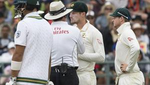 South African broadcasters, who caught opener Cameron Bancroft (R) using a yellow piece of paper to roughen the surface, claim that they were tipped off about the incident.(AP) South African broadcasters, who caught opener Cameron Bancroft (R) using a yellow piece of paper to roughen the surface, claim that they were tipped off about the incident.(AP)