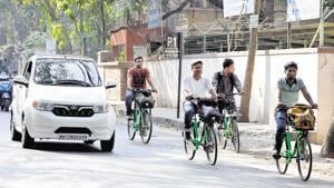 People use the public bicycle sharing scheme at Prabhat road on Monday.(Rahul Raut/HT) People use the public bicycle sharing scheme at Prabhat road on Monday.(Rahul Raut/HT)