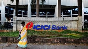 FILE PHOTO: A municipal worker walks past a logo of ICICI Bank at its headquarters in Mumbai October 25, 2013. REUTERS/Danish Siddiqui/File Photo GLOBAL BUSINESS WEEK AHEAD SEARCH GLOBAL BUSINESS 29 JAN FOR ALL IMAGES(REUTERS File Photo) FILE PHOTO: A municipal worker walks past a logo of ICICI Bank at its headquarters in Mumbai October 25, 2013. REUTERS/Danish Siddiqui/File Photo GLOBAL BUSINESS WEEK AHEAD SEARCH GLOBAL BUSINESS 29 JAN FOR ALL IMAGES(REUTERS File Photo)