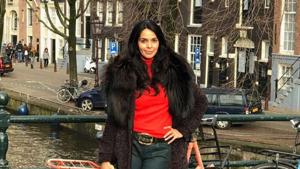 Actor Mallika Sherawat was on a work-cum-leisure trip to Amsterdam, and visited the tulip fields there. Actor Mallika Sherawat was on a work-cum-leisure trip to Amsterdam, and visited the tulip fields there.