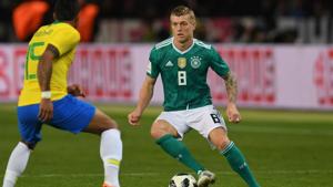 Germany's midfielder Toni Kroos (R) and Brazil's midfielder Paulinho vie for the ball during their international friendly football match in Berlin on Tuesday.(AFP) Germany's midfielder Toni Kroos (R) and Brazil's midfielder Paulinho vie for the ball during their international friendly football match in Berlin on Tuesday.(AFP)