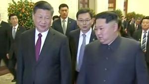 Chinese president Xi Jinping walks with North Korean leader Kim Jong Un, in this still image taken from video released on March 28, 2018.(Reuters) Chinese president Xi Jinping walks with North Korean leader Kim Jong Un, in this still image taken from video released on March 28, 2018.(Reuters)