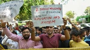Students protest over the alleged paper leak, at Jantar Mantar in New Delhi, on Thursday.(PTI Photo) Students protest over the alleged paper leak, at Jantar Mantar in New Delhi, on Thursday.(PTI Photo)