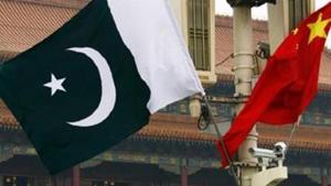 A Pakistan national flag flies alongside a Chinese national flag in front of the portrait of Chairman Mao Zedong on Beijing's Tiananmen Square on May 18, 2011.(Reuters file Photo) A Pakistan national flag flies alongside a Chinese national flag in front of the portrait of Chairman Mao Zedong on Beijing's Tiananmen Square on May 18, 2011.(Reuters file Photo)