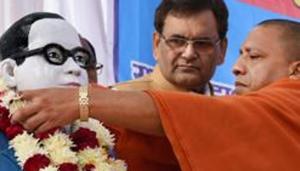 Uttar Pradesh Chief Minister Yogi Adityanath paying floral tributes to Babasaheb Dr Bhimrao Ambedkar.(PTI file photo) Uttar Pradesh Chief Minister Yogi Adityanath paying floral tributes to Babasaheb Dr Bhimrao Ambedkar.(PTI file photo)