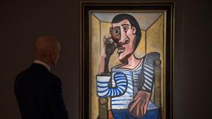 Conor Jordan, deputy chairman of impressionist and modern art at Christie's looks to Pablo Picasso's 'Le Marin' during a media preview of Christie's Hong Kong Spring Sales in Hong Kong.(AFP) Conor Jordan, deputy chairman of impressionist and modern art at Christie's looks to Pablo Picasso's 'Le Marin' during a media preview of Christie's Hong Kong Spring Sales in Hong Kong.(AFP)
