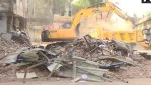 At least 10 people were killed after a four-storey building collapsed near Sarvate bus stand in Indore on Saturday evening.(ANI Photo) At least 10 people were killed after a four-storey building collapsed near Sarvate bus stand in Indore on Saturday evening.(ANI Photo)