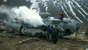 The personnel of Nehru Institute of Mountaineering and local police swung into action soon after the Russian-origin transport helicopter crashed above the helipad located behind the Kedarnath shrine on Tuesday.(NIM)
