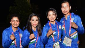 Indian boxing contingent (L-R) Pinki Rani Jangra, Mary Kom, Sarita Devi Laishram and Lovlina Borgohain during the country's flag-hoisting ceremony at the Commonwealth Games 2018 in Gold Coast.(PTI) Indian boxing contingent (L-R) Pinki Rani Jangra, Mary Kom, Sarita Devi Laishram and Lovlina Borgohain during the country's flag-hoisting ceremony at the Commonwealth Games 2018 in Gold Coast.(PTI)